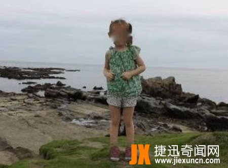 神奈川小女孩照片:父亲带女儿去日本度假,在海边玩耍时拍了照片，一看照片，太恐怖